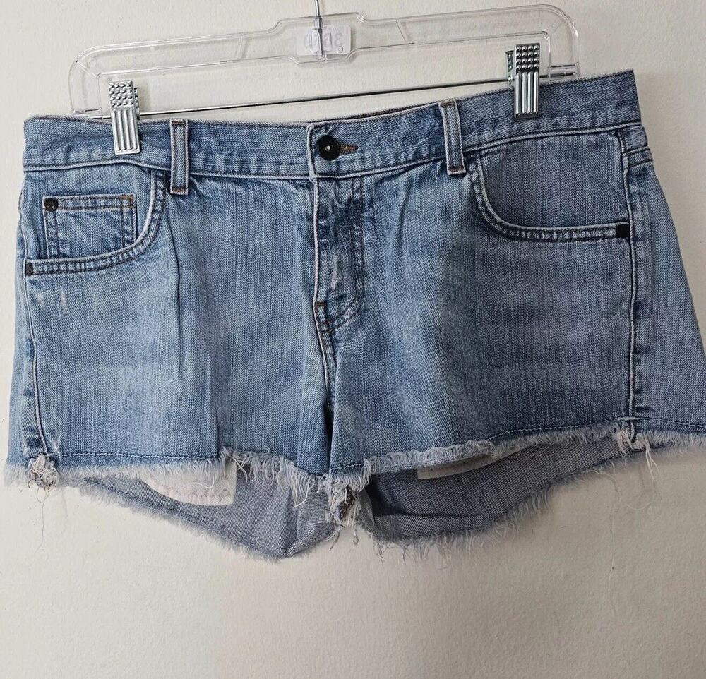 RARE Vans X Jesse Jo Medium -Wash Leopard Print Waist Raw Hem Jean Shorts 11